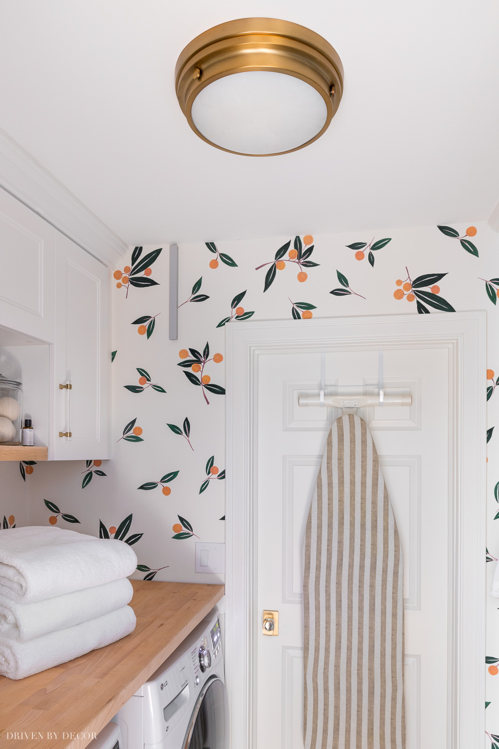 Love this simple but stylish flush mount ceiling light in our laundry room!