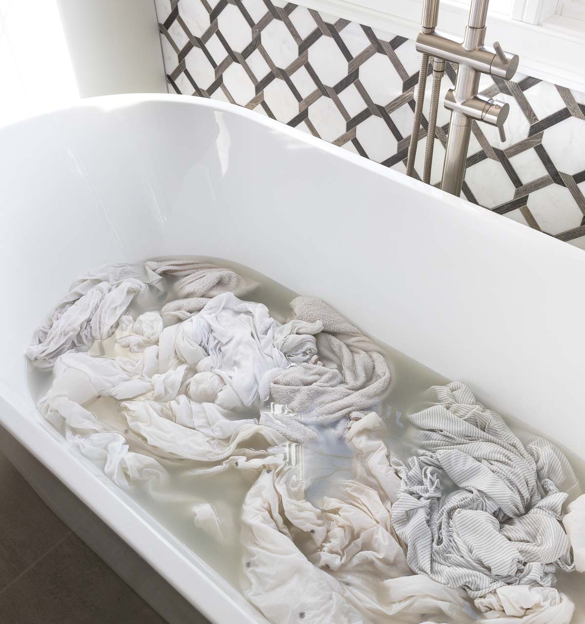 One hour after using laundry strip recipe to get build-up out of clothes