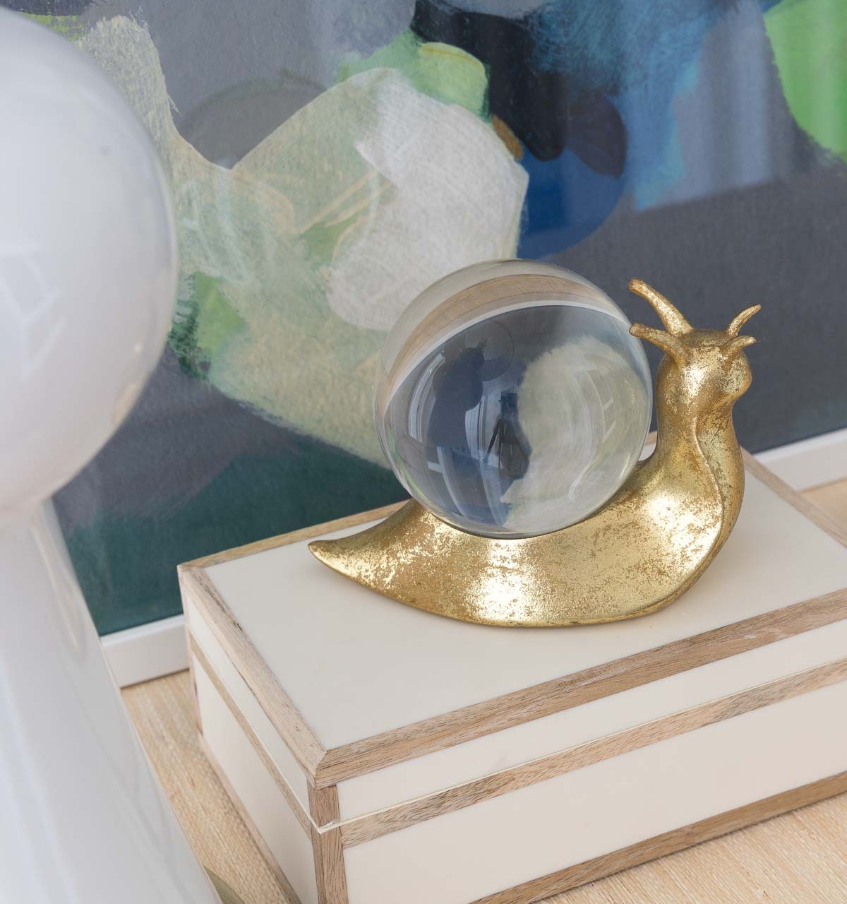 This decorative brass snail on my entryway console is one of my favorite accessories!