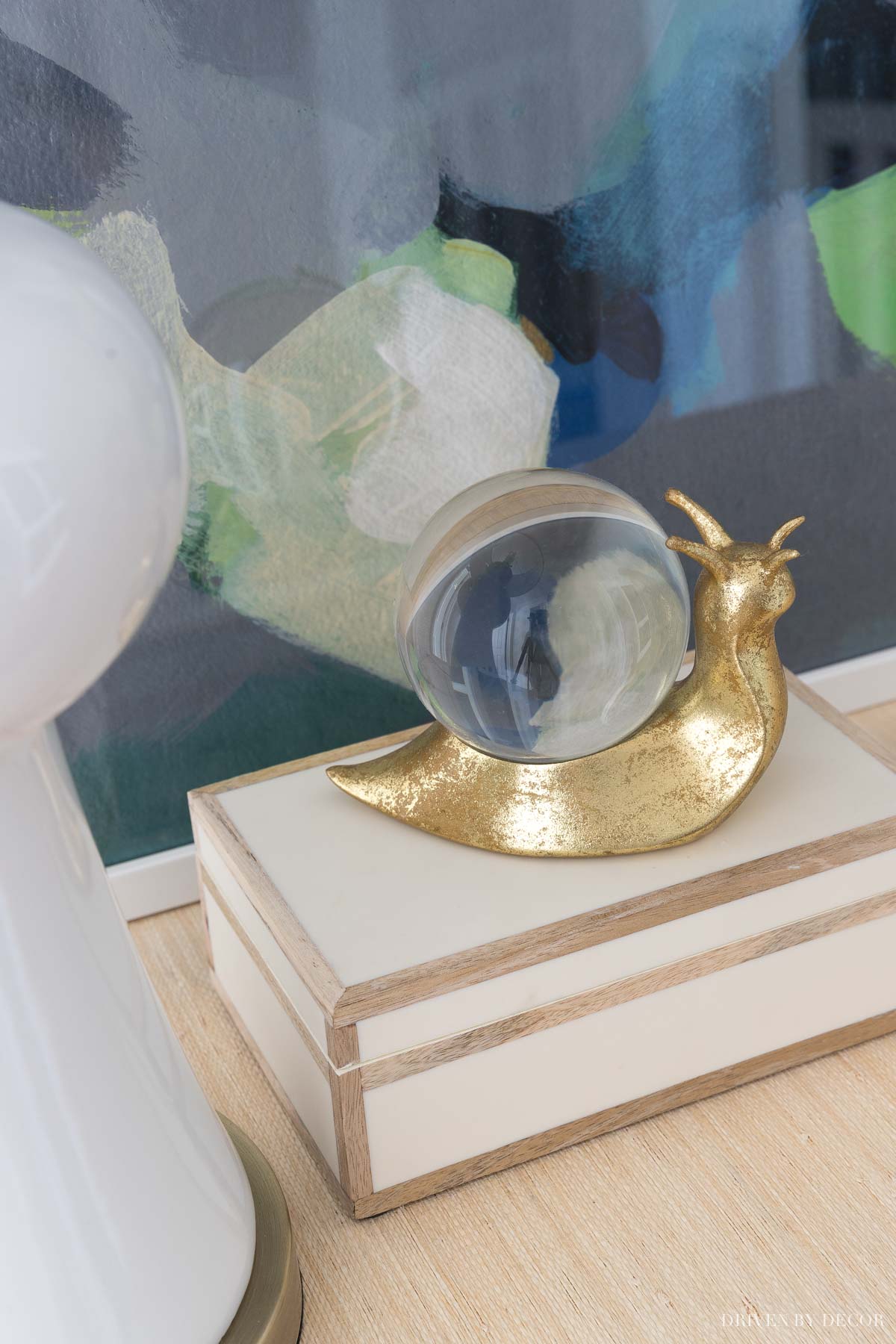 This decorative brass snail on my entryway console is one of my favorite accessories!