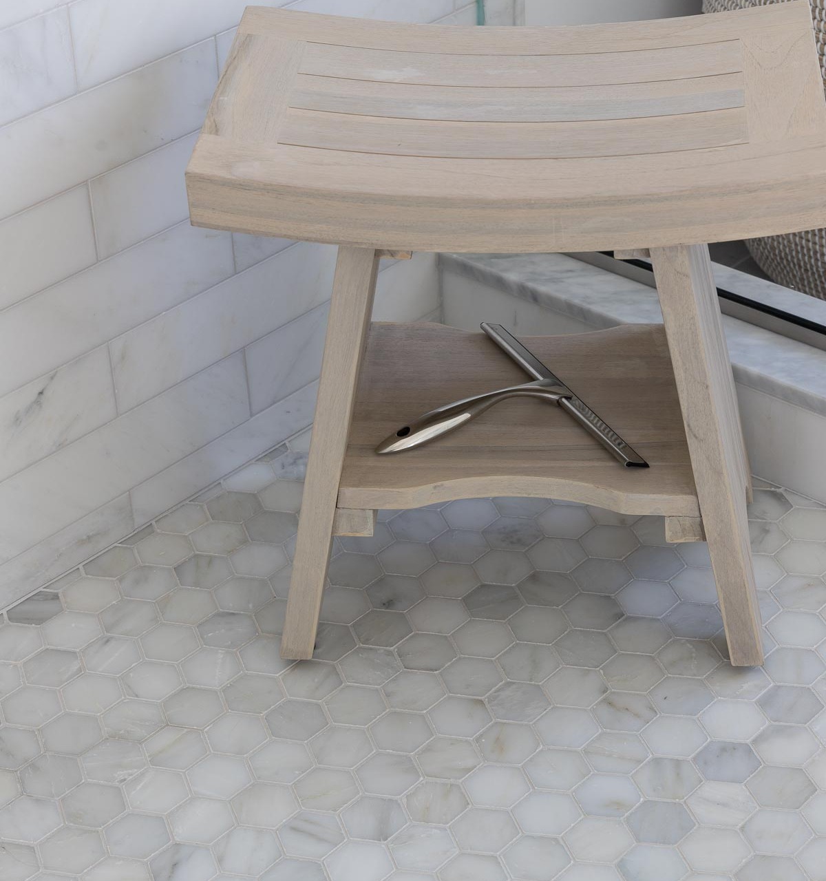 This squeegee is a must-have for keeping marble tile clean in bathrooms!