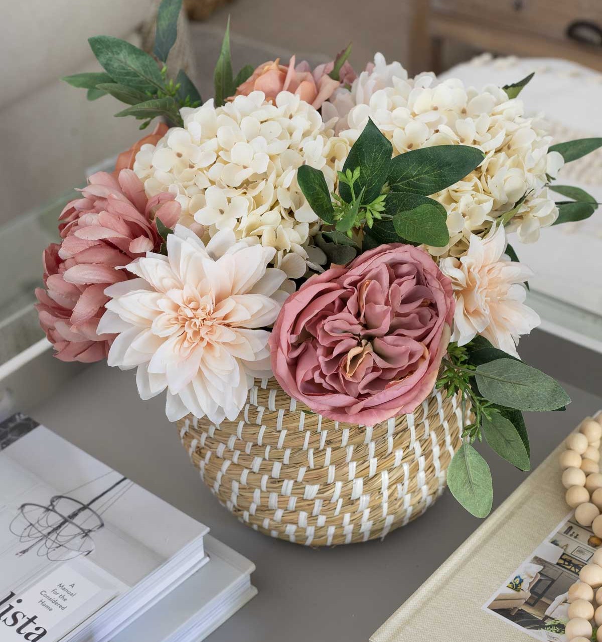 The artificial flowers on our family room coffee table