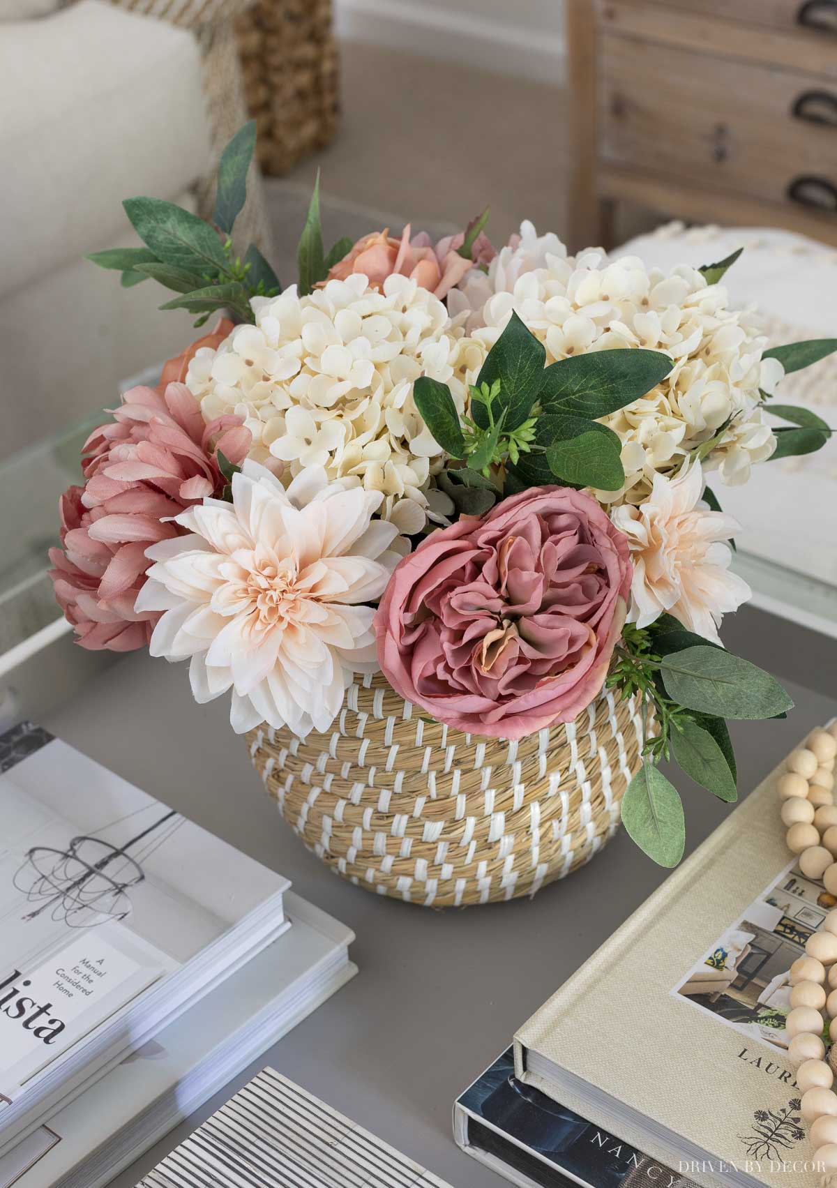 The artificial flowers on our family room coffee table