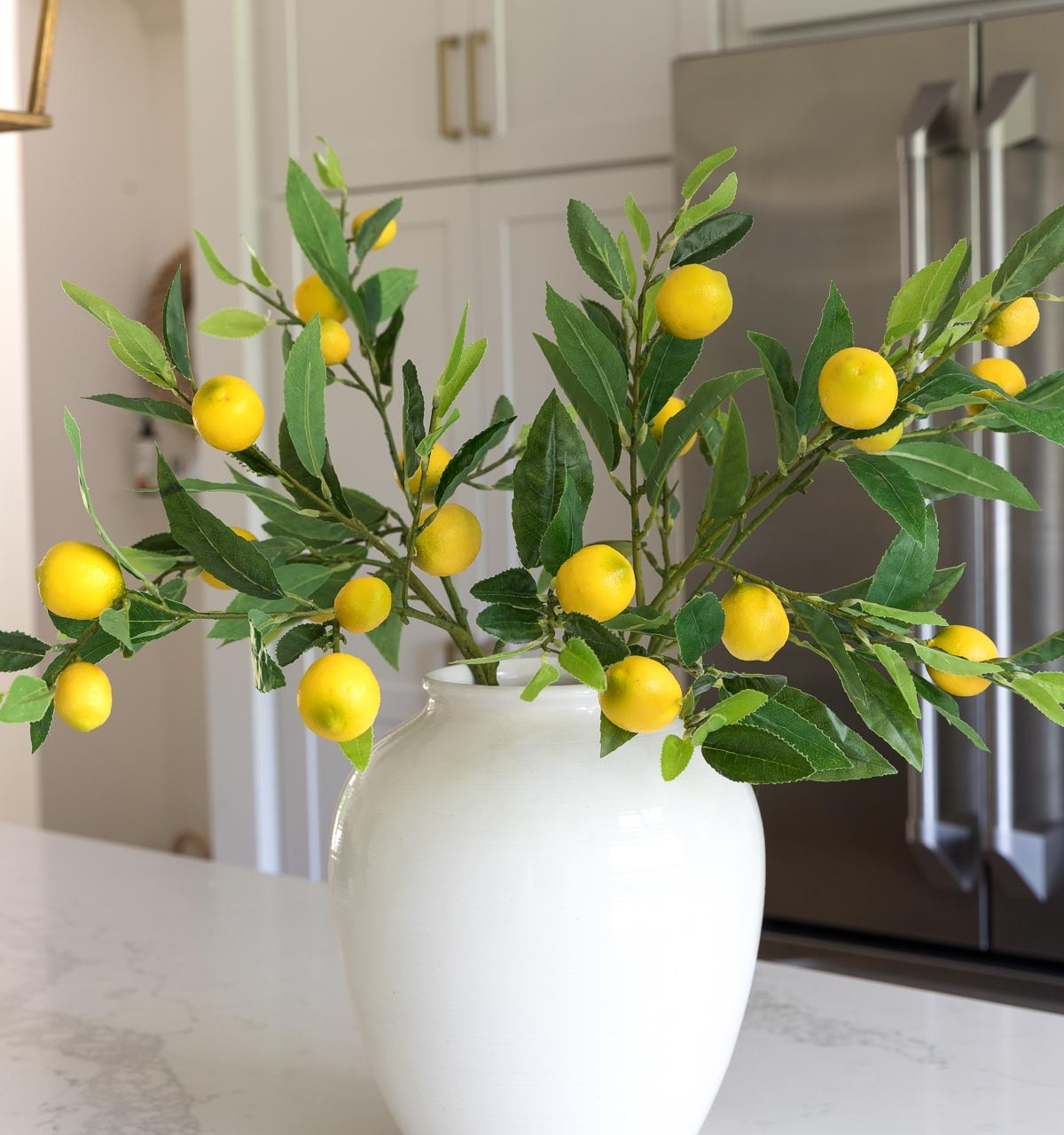Love these artificial lemon branches! More on these and other great artificial flowers are in this post!