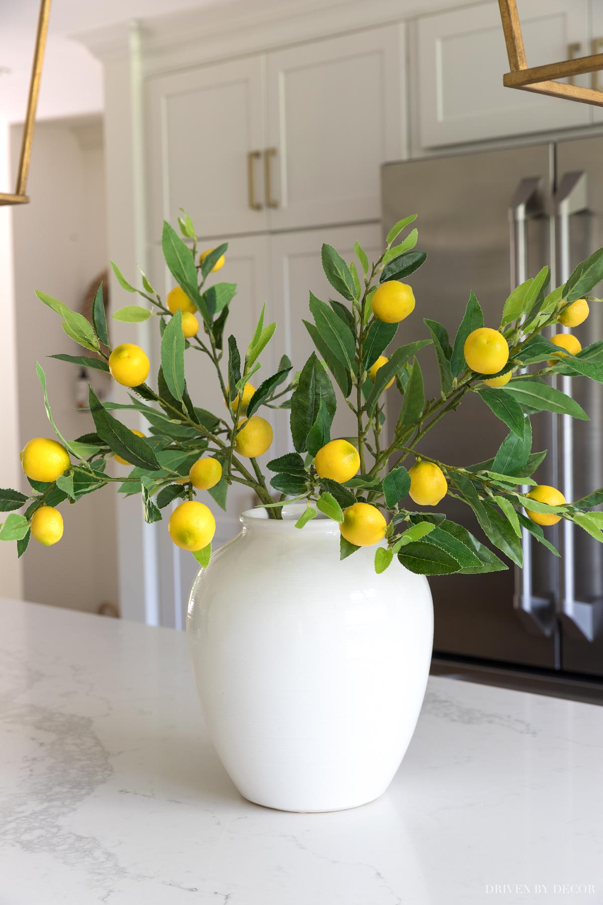 Love these artificial lemon branches! More on these and other great artificial flowers are in this post!