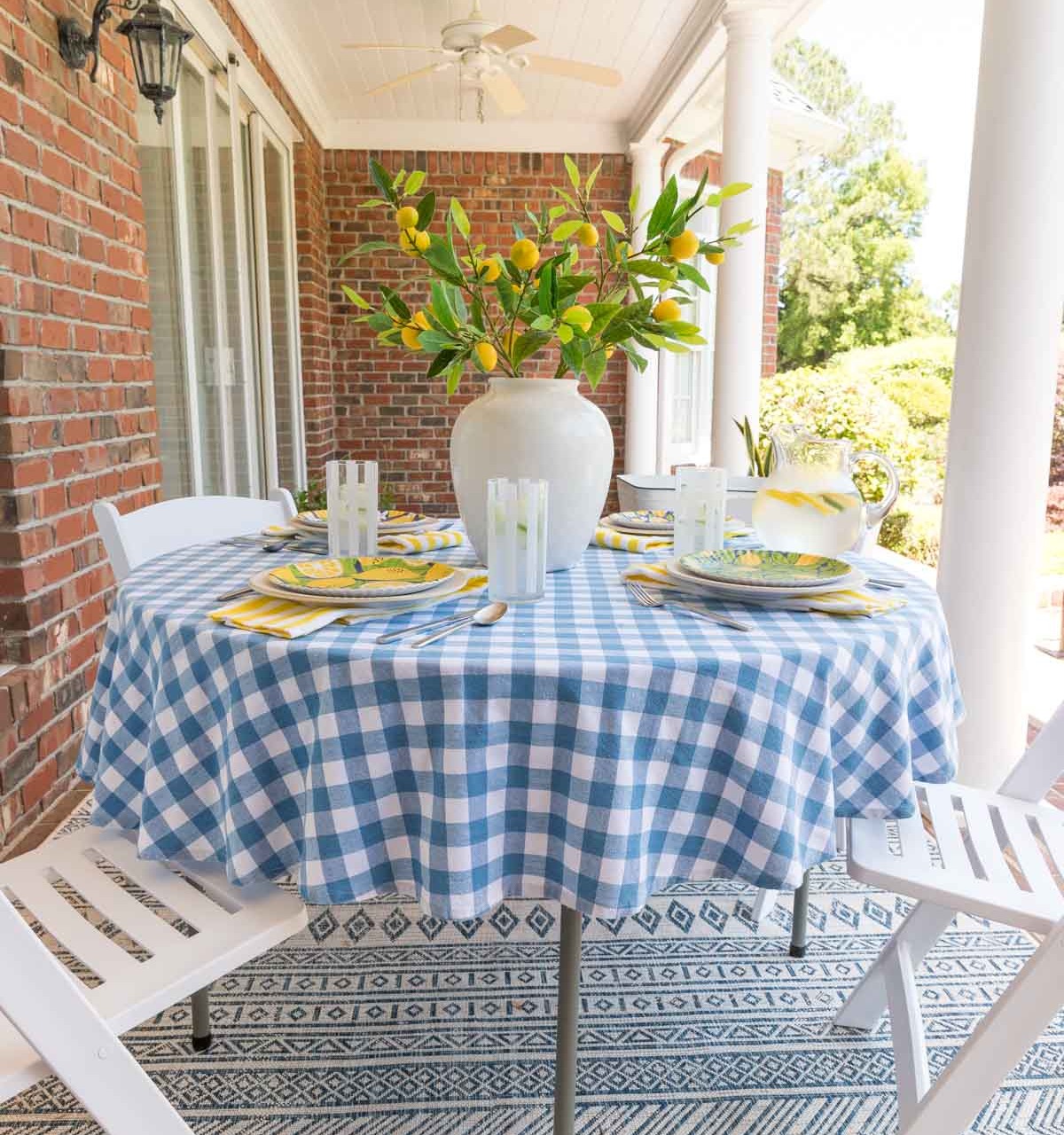 Create a stylish outdoor dining space with a simple folding table and chairs!