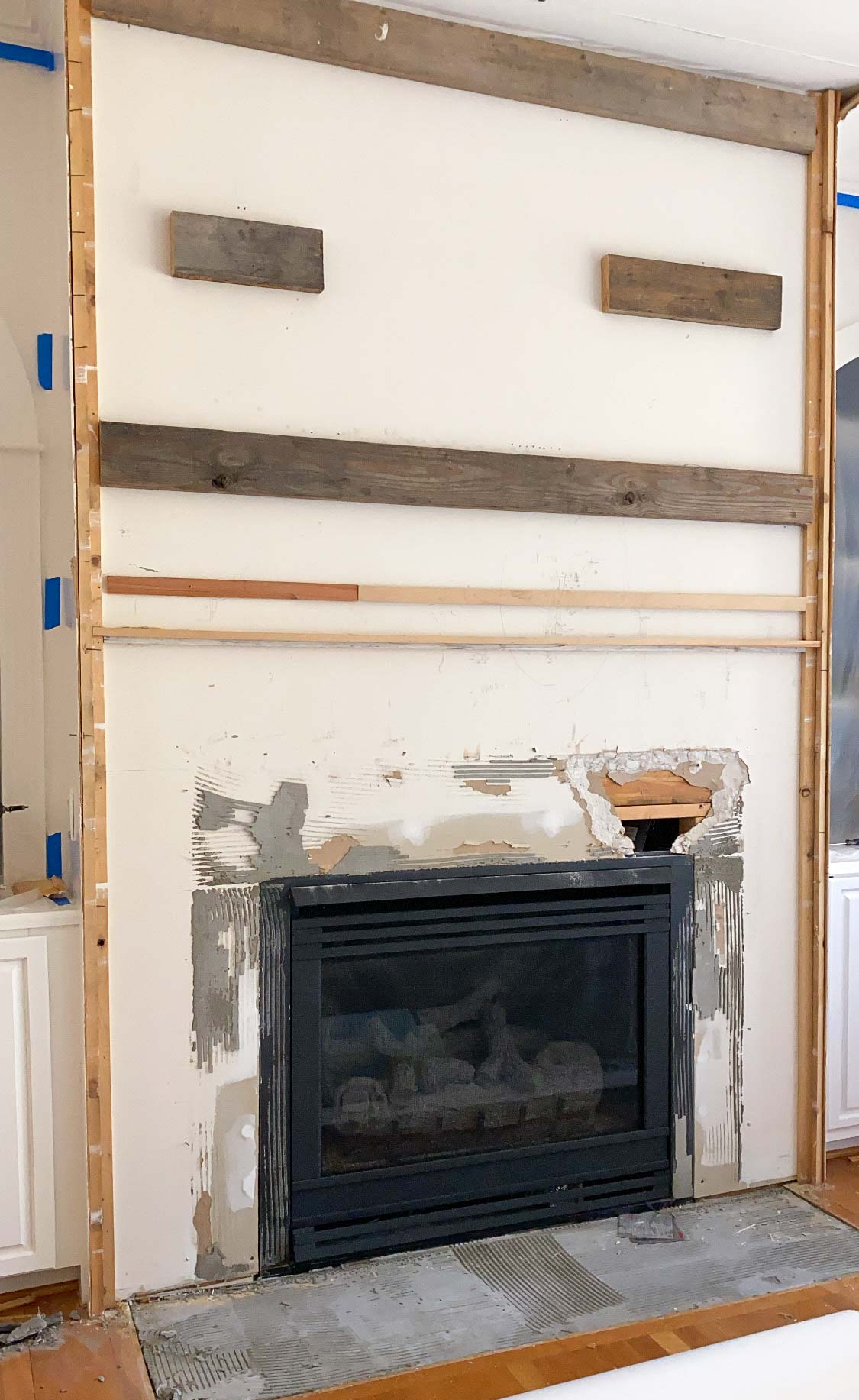 Removing the face of our fireplace to modernize the design