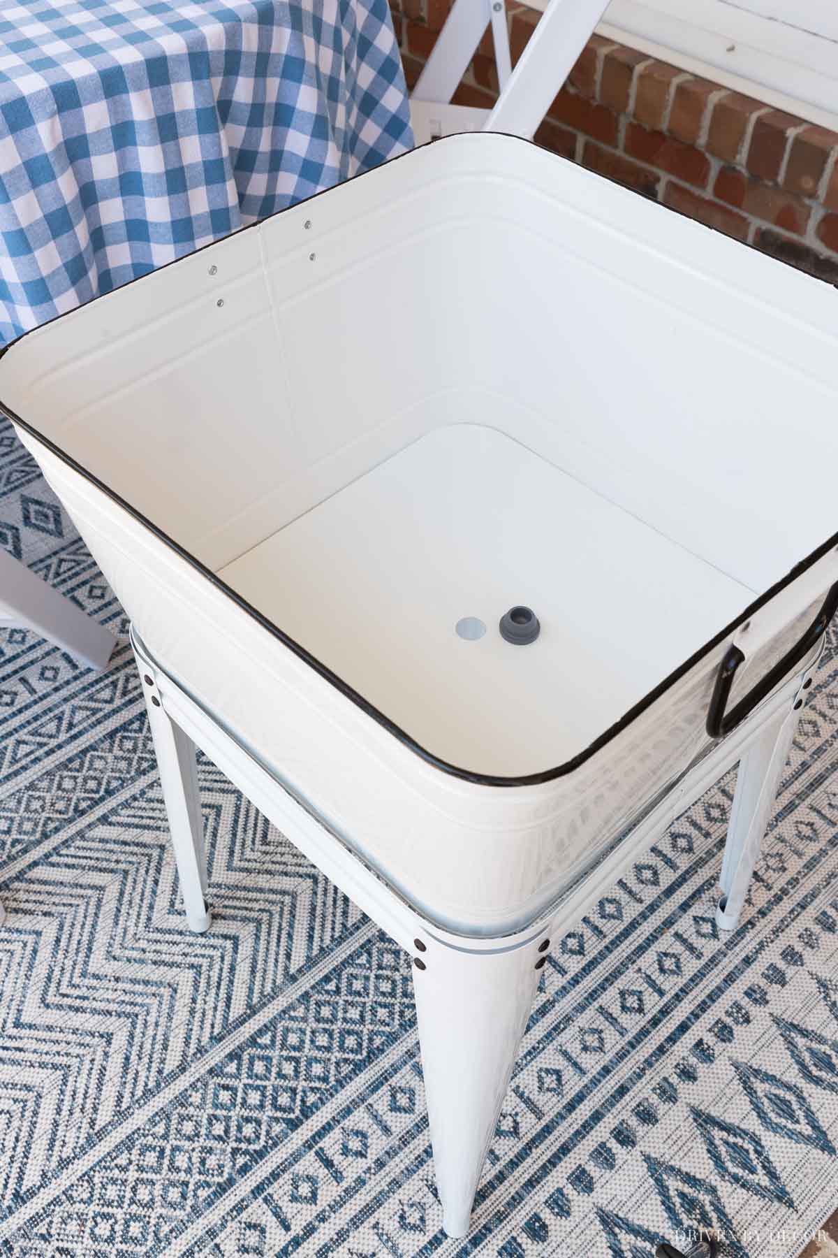 I love that this outdoor cooler has a plug in the bottom for draining water from melted ice!
