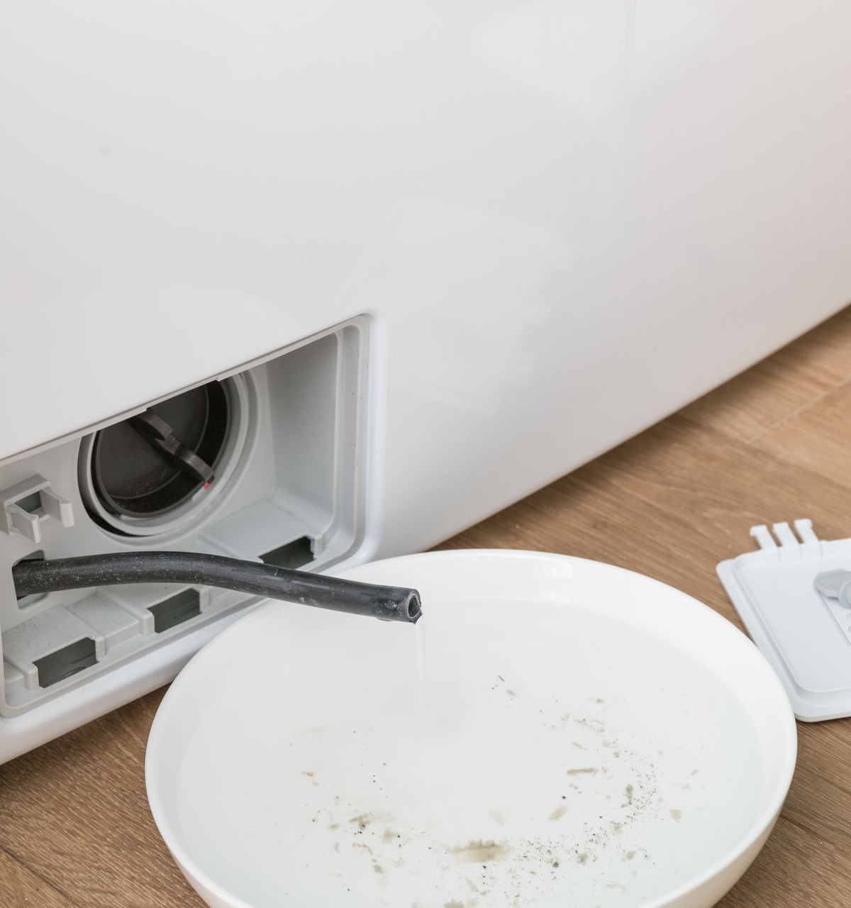 How to deep clean your washing machine including draining the water from this hose!