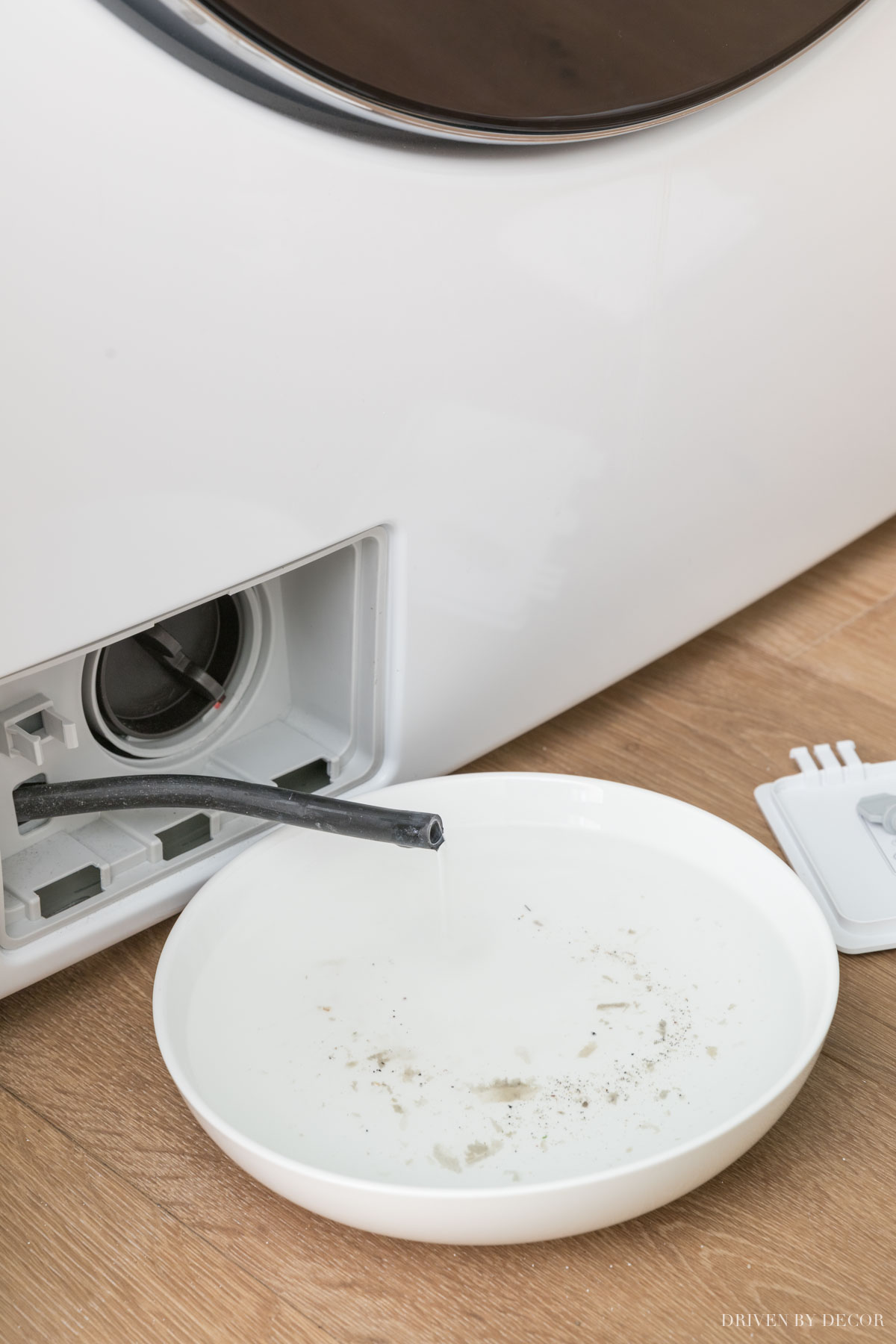 How to deep clean your washing machine including draining the water from this hose!