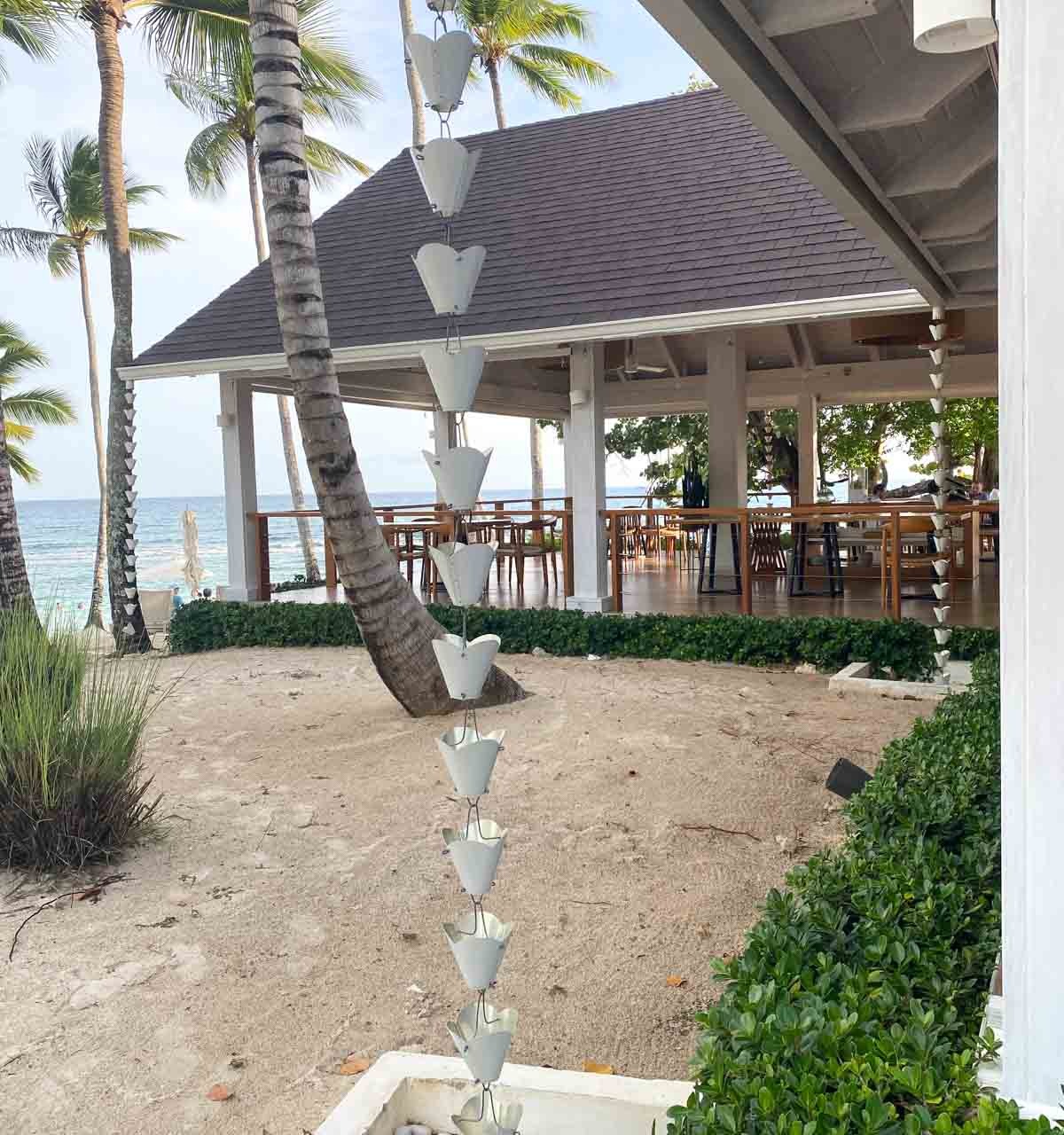 Love these decorative rain chains instead of gutters!