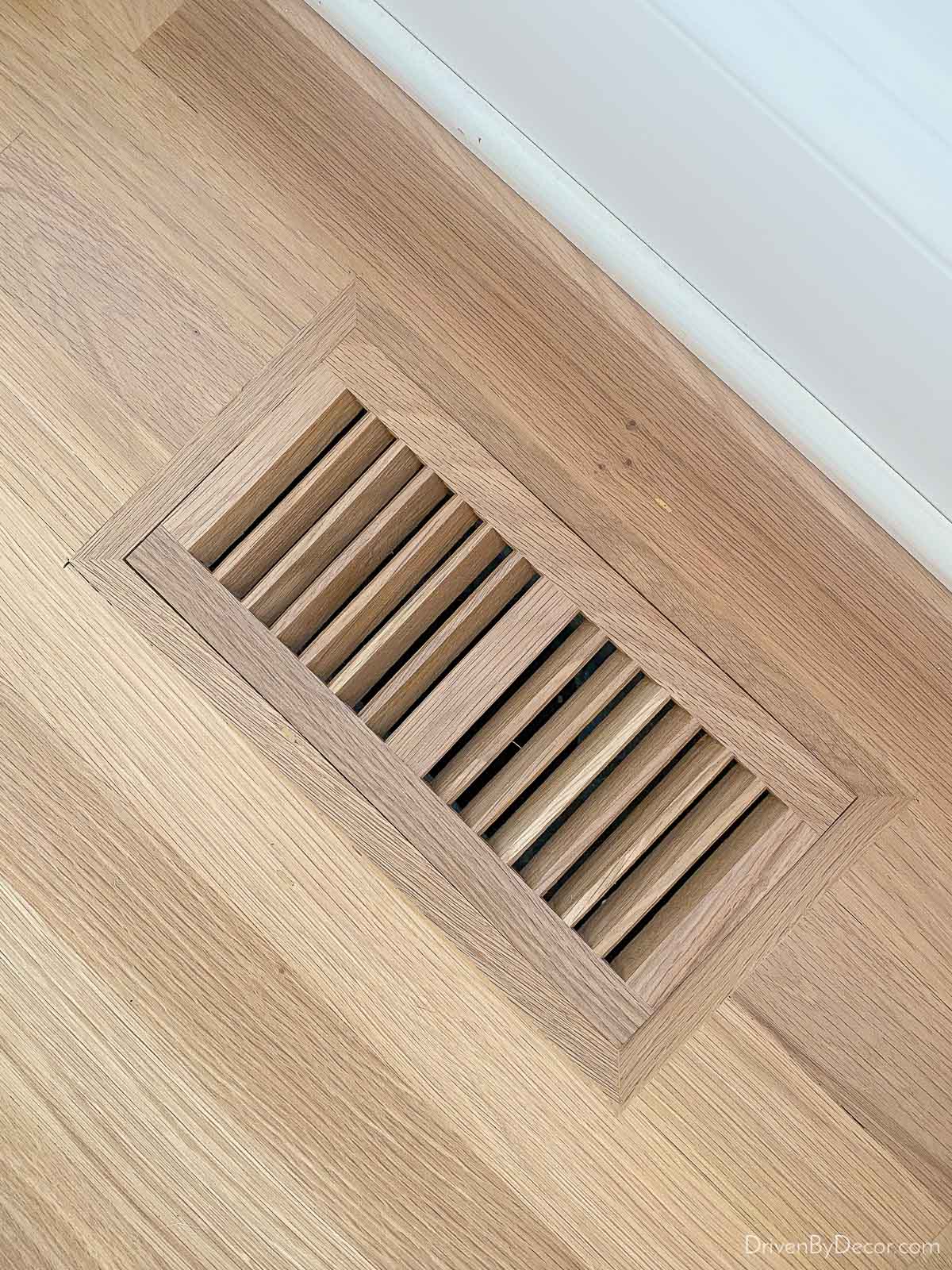 Custom wood floor vent as part of hardwood floor refinishing project