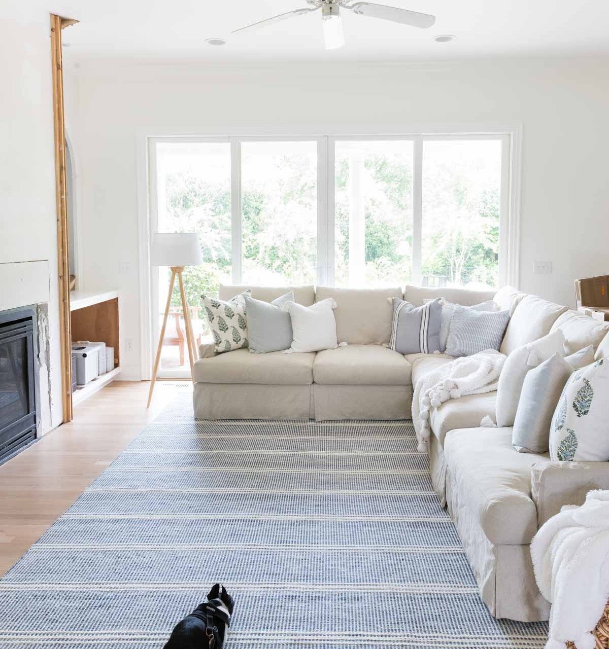 Our family room remodel in-progress including the addition of a large rug