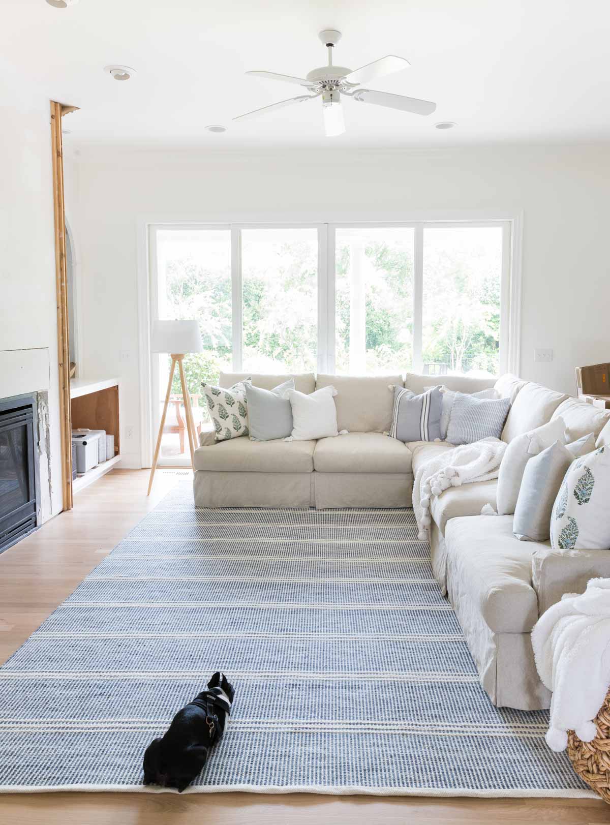 Our family room remodel in-progress including the addition of a large rug