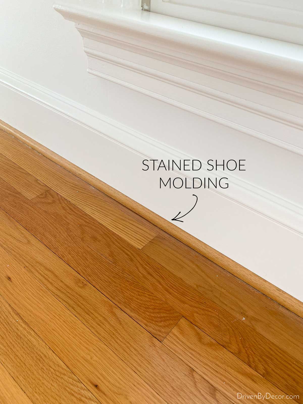 Hardwood floors with stained shoe molding