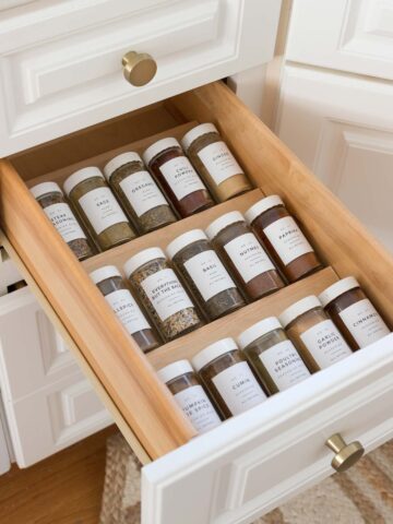 This wood kitchen drawer spice organizer makes your spices so easy to find!