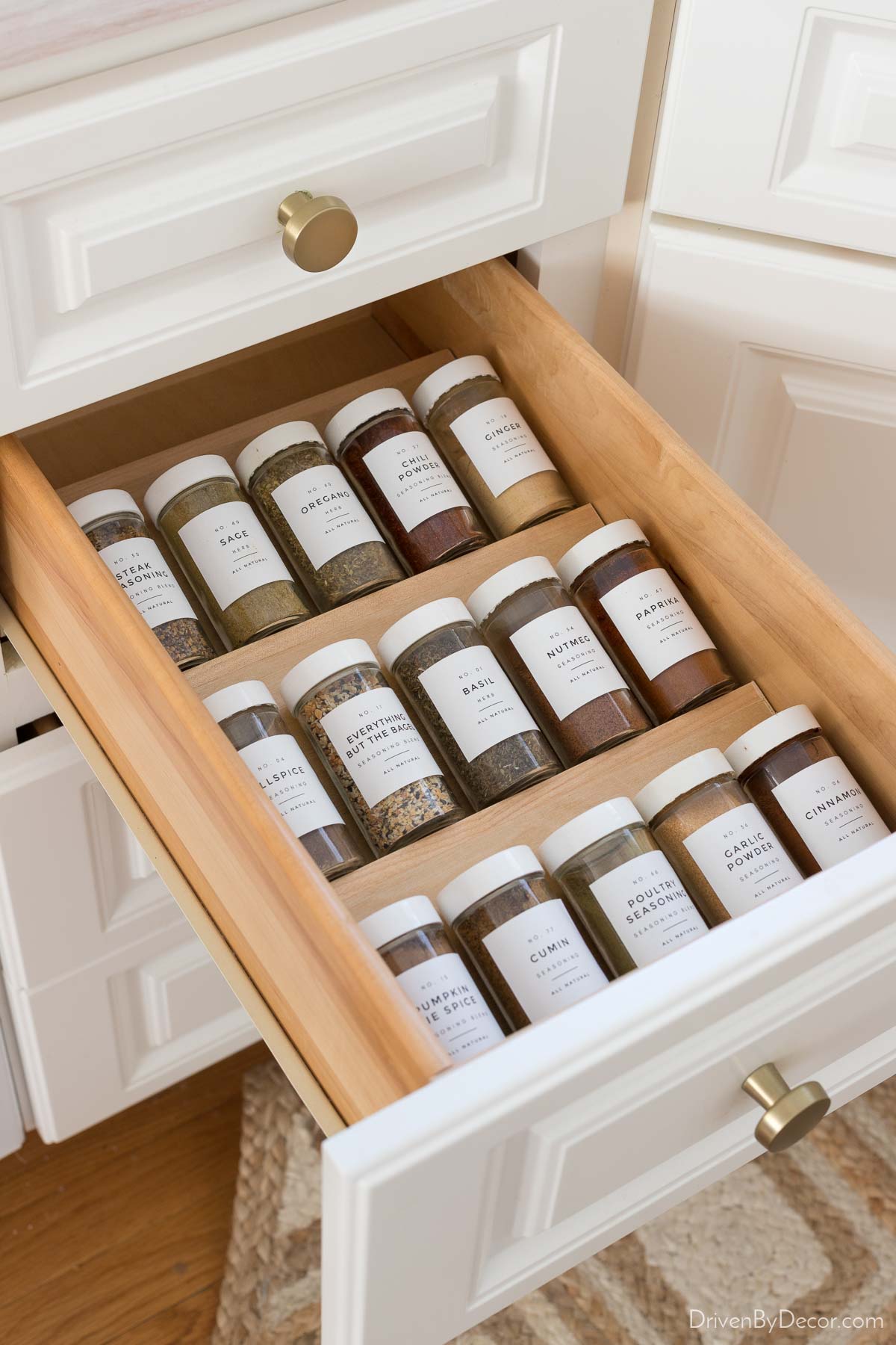 This wood kitchen drawer spice organizer makes your spices so easy to find!