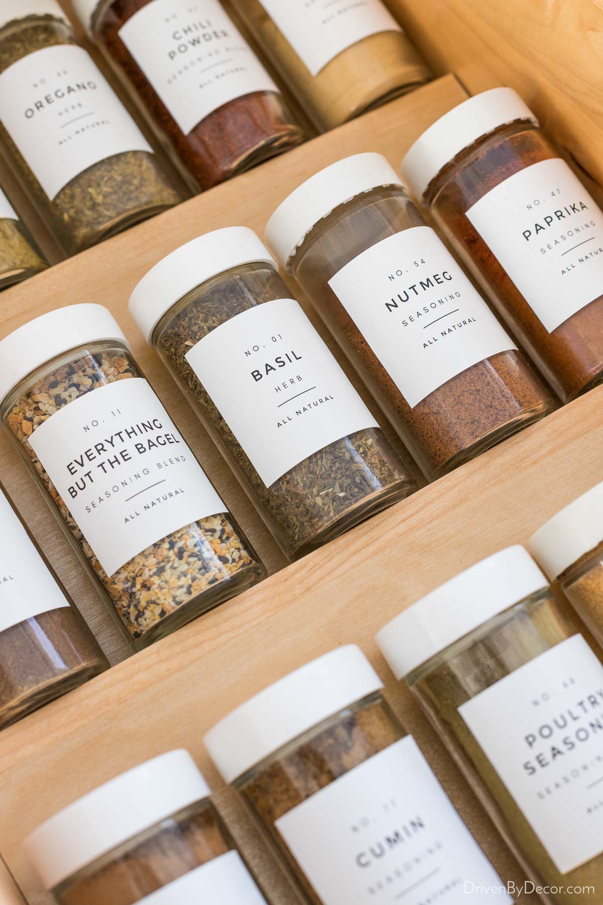 Spice jars with simple matching labels helped organize them in our kitchen drawers!