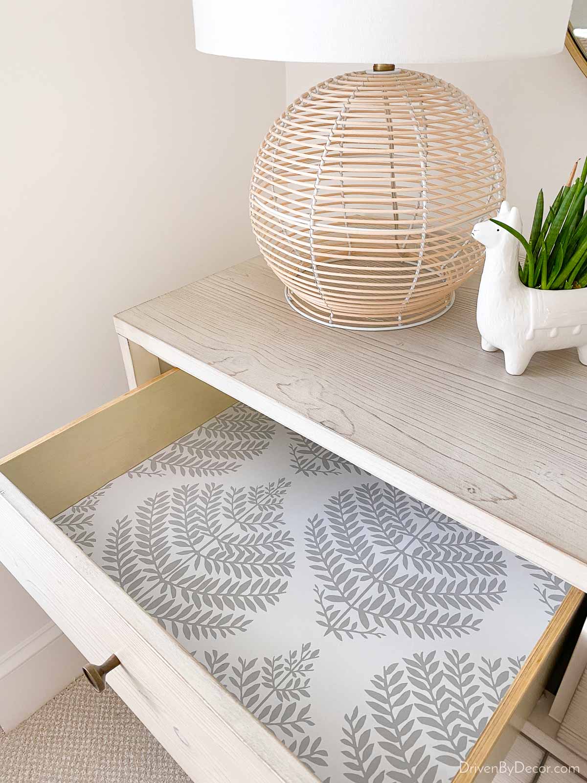 Love this wallpaper idea of using a favorite peel and stick wallpaper to line your drawers!