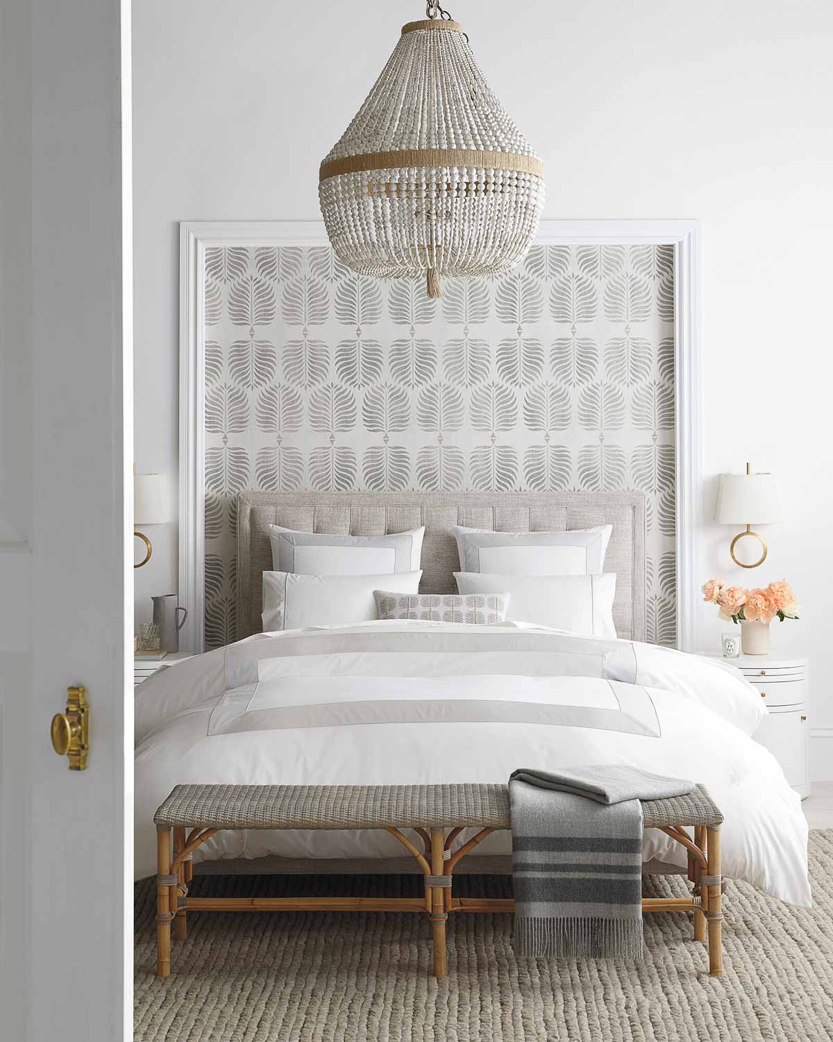 Love the idea of using wallpaper in a bedroom to frame the bed!