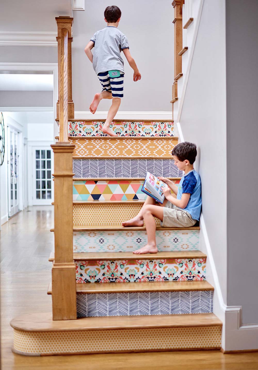 Wallpaper your stair risers for a fun pop of unexpected color and pattern