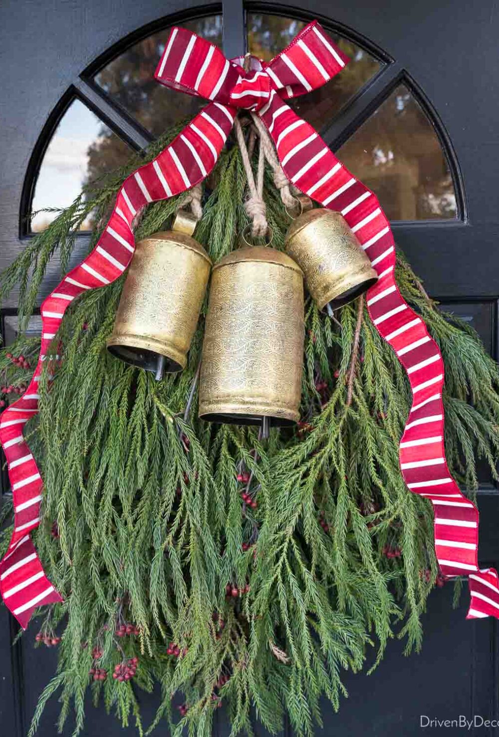 Love these gorgeous etched bells used as part of a holiday swag!