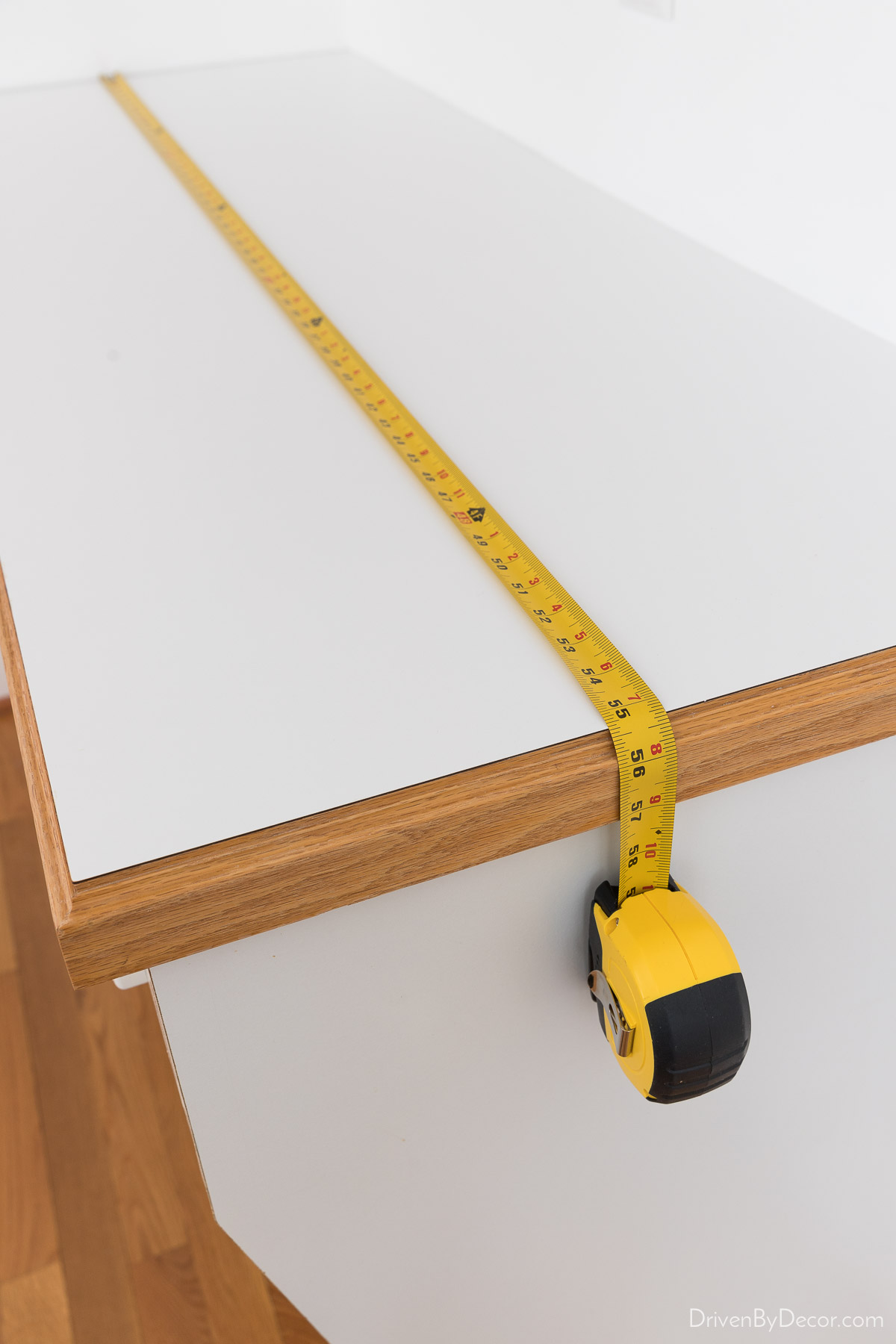 Measure your countertop before cutting your marble contact paper to cover it