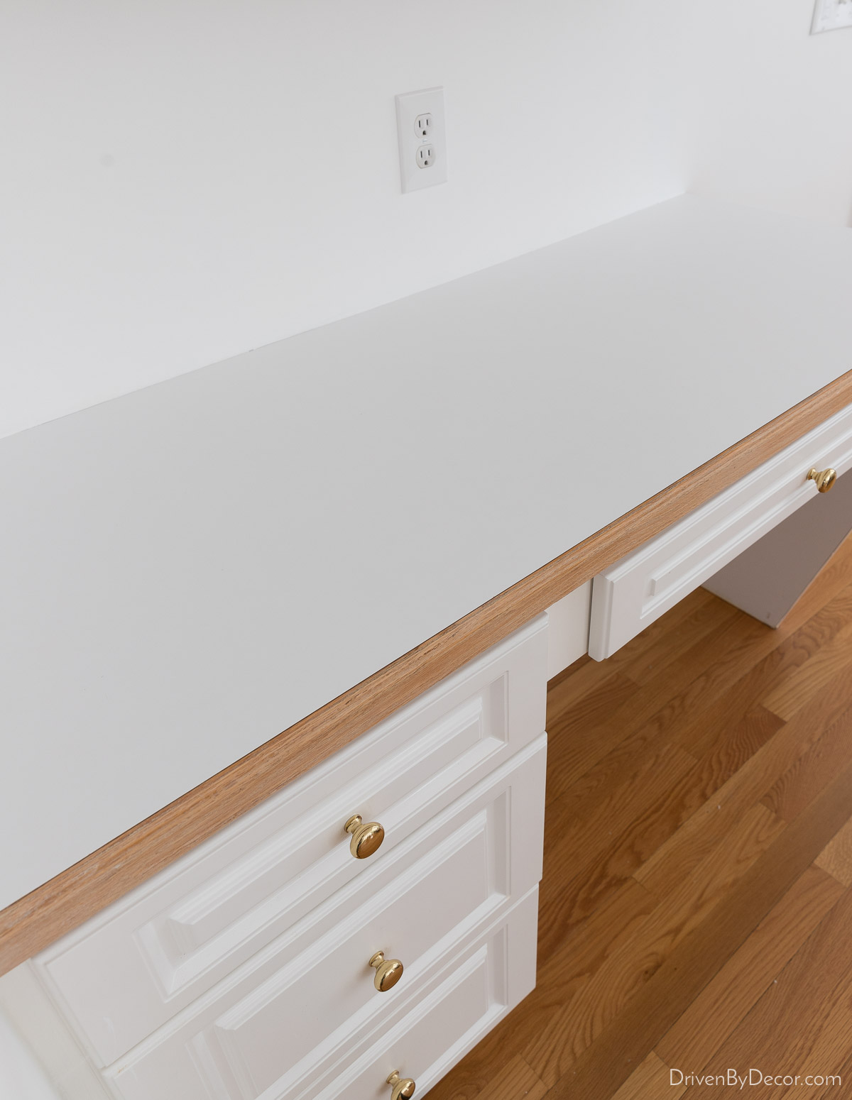 The white laminate countertops I covered with marble contact paper