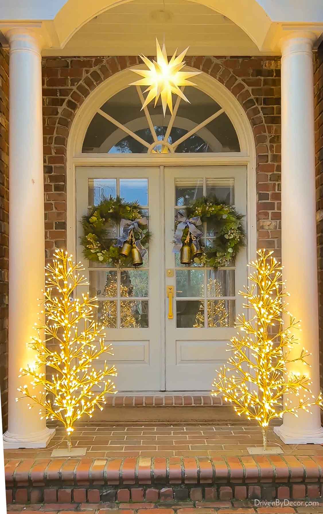 Our outdoor Moravian star and twinkling LED trees on our front porch