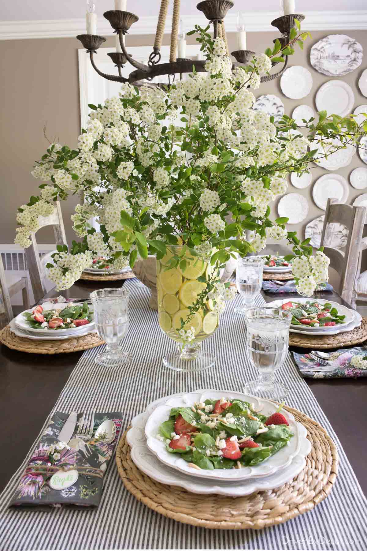 A lemon-lined vase is perfect for this spring flower arrangement!
