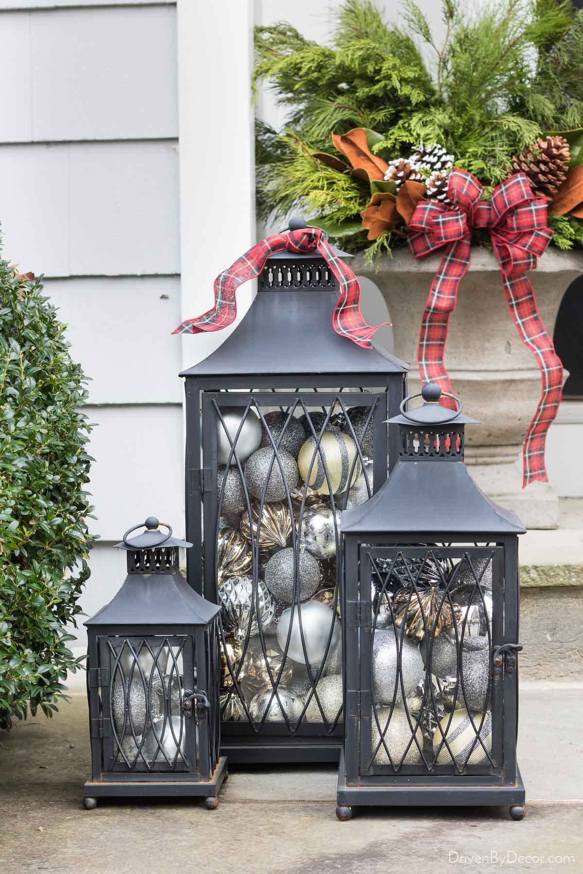 Fill lanterns with ornaments - such a simple Christmas decorating idea!