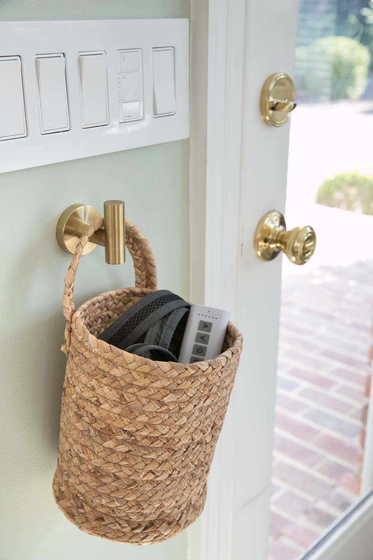 Hanging storage basket near patio door