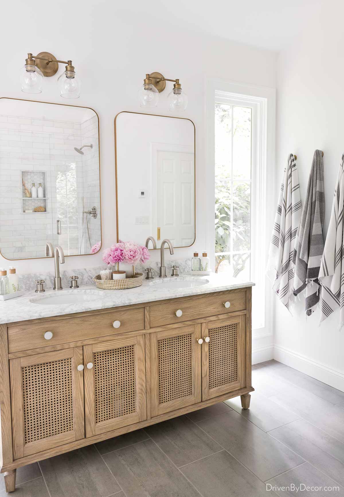 Love the bathroom lighting idea of mixing metal finishes!