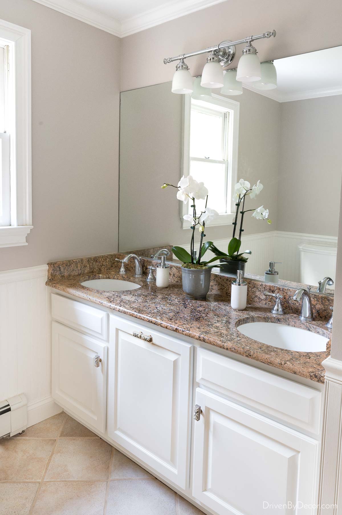 A simple swap of the vanity light shades gives it a whole new look!