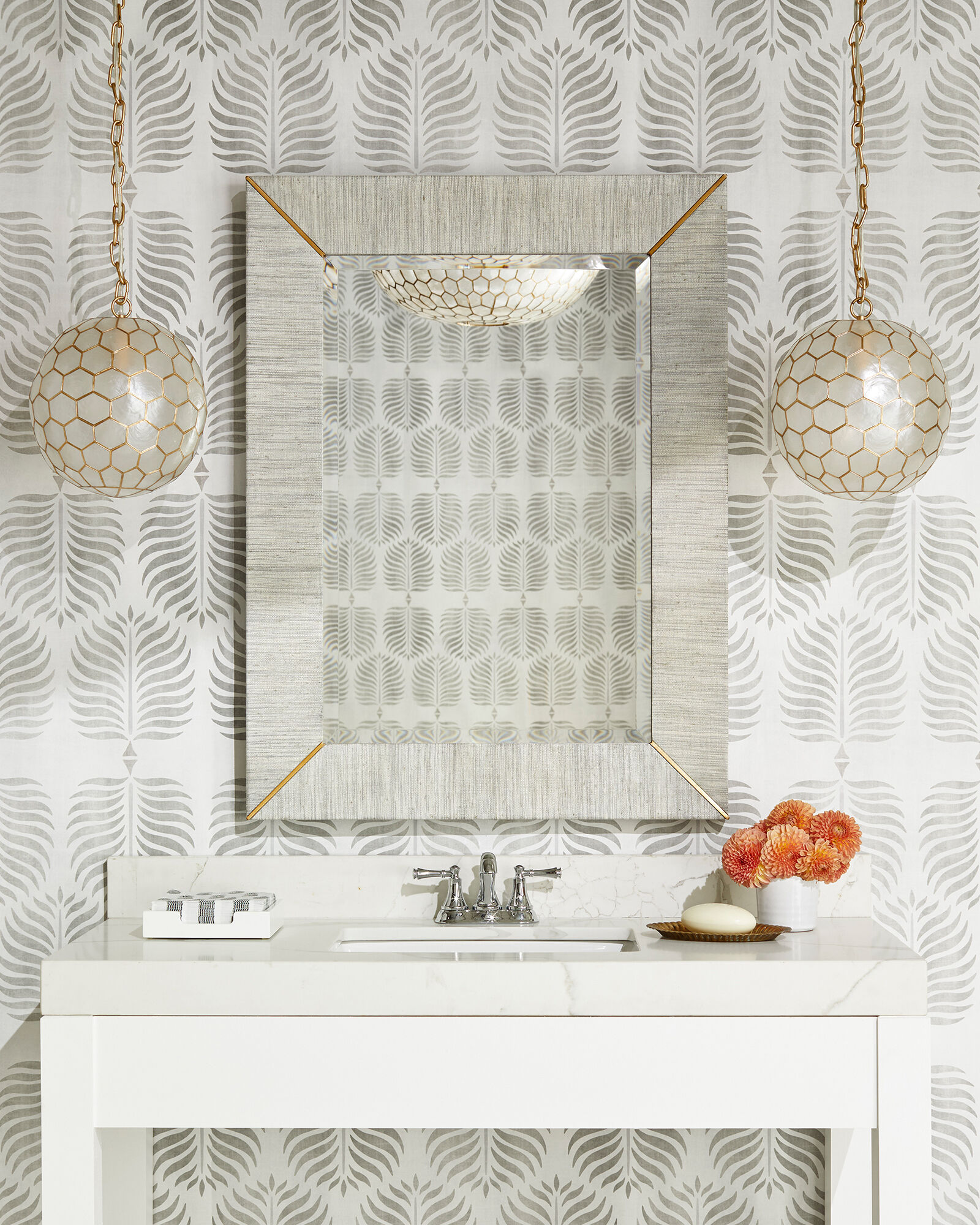 Love this bathroom lighting idea of using pendants instead of sconces for vanity lighting