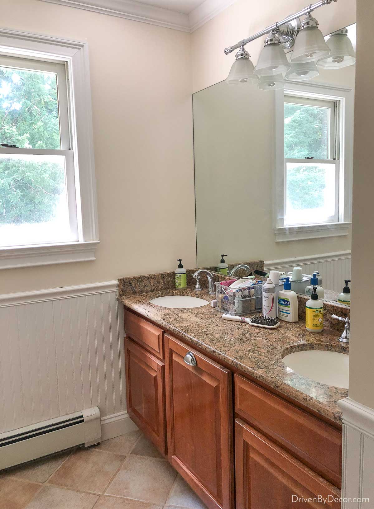 Our old bathroom lighting before updating the glass shades