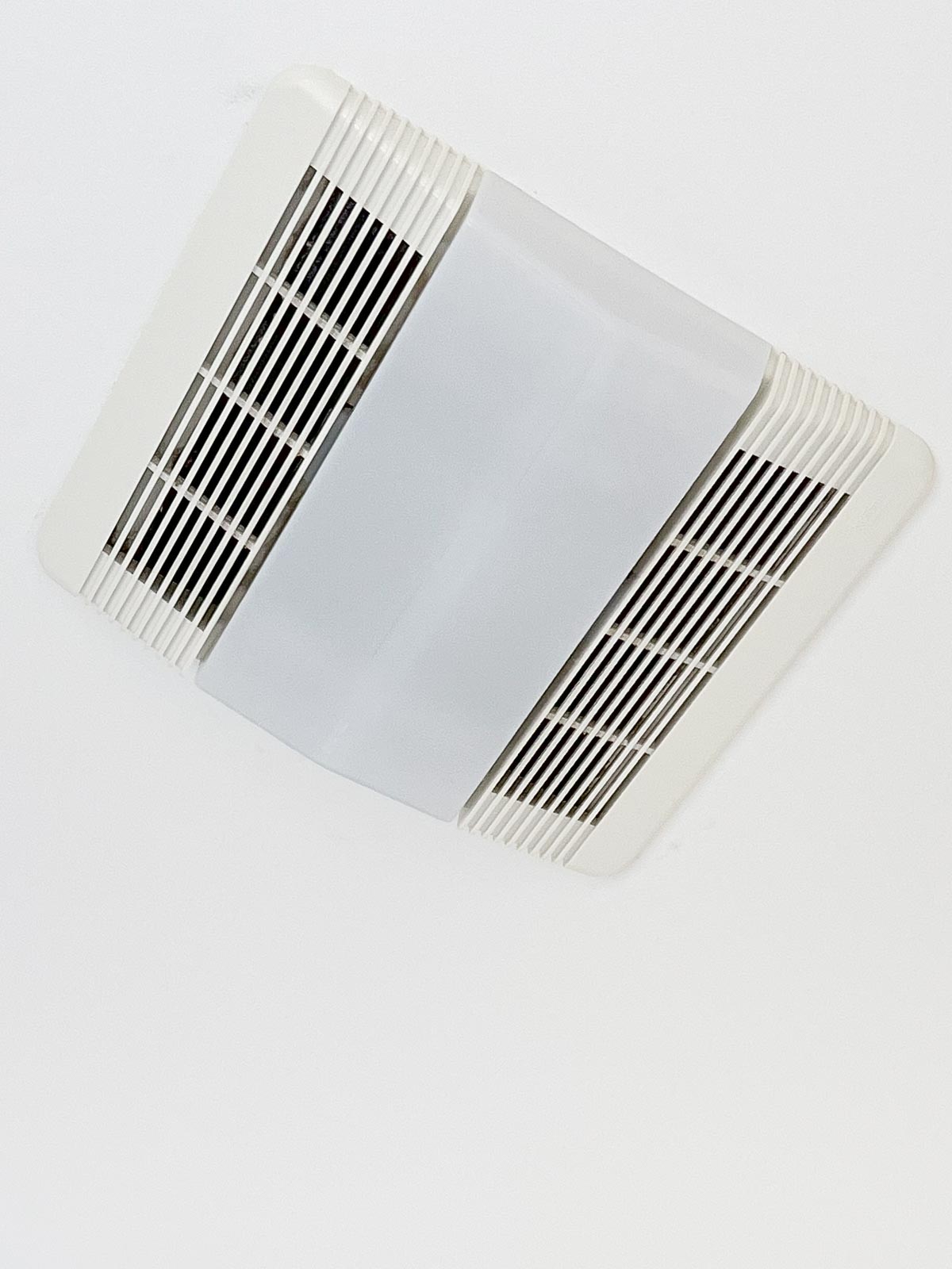 Ugly combination bathroom light and exhaust fan