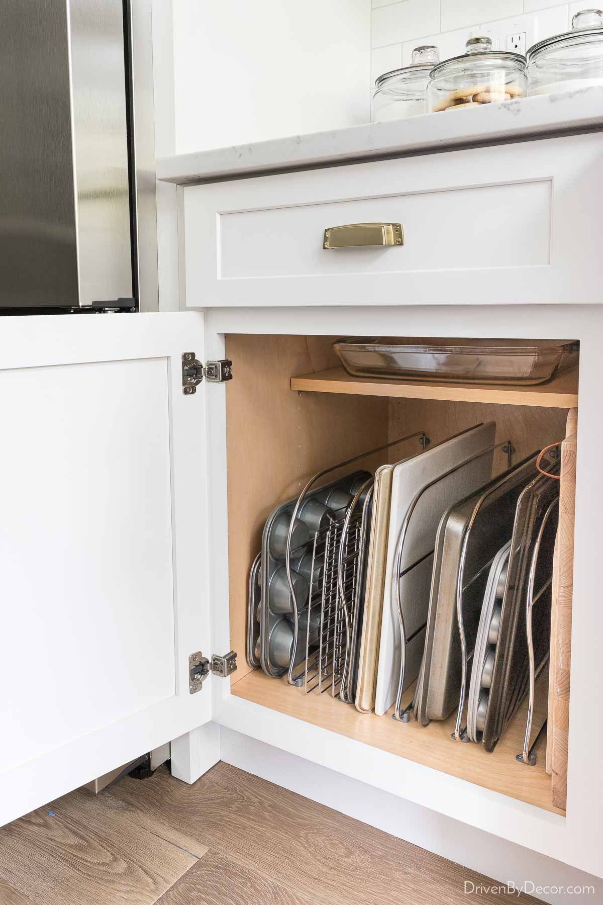 Cabinet dividers for organizing trays and sheets in your kitchen