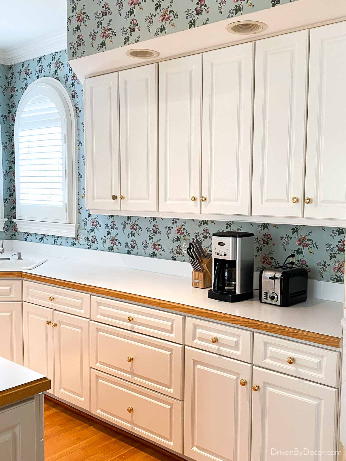 Our dated kitchen backsplash before our budget kitchen remodel