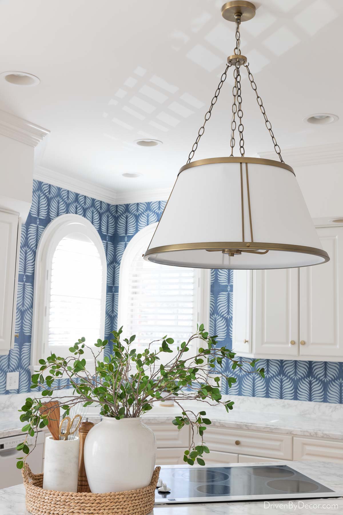 Replacing light fixtures is one tip for a kitchen remodel on a budget!