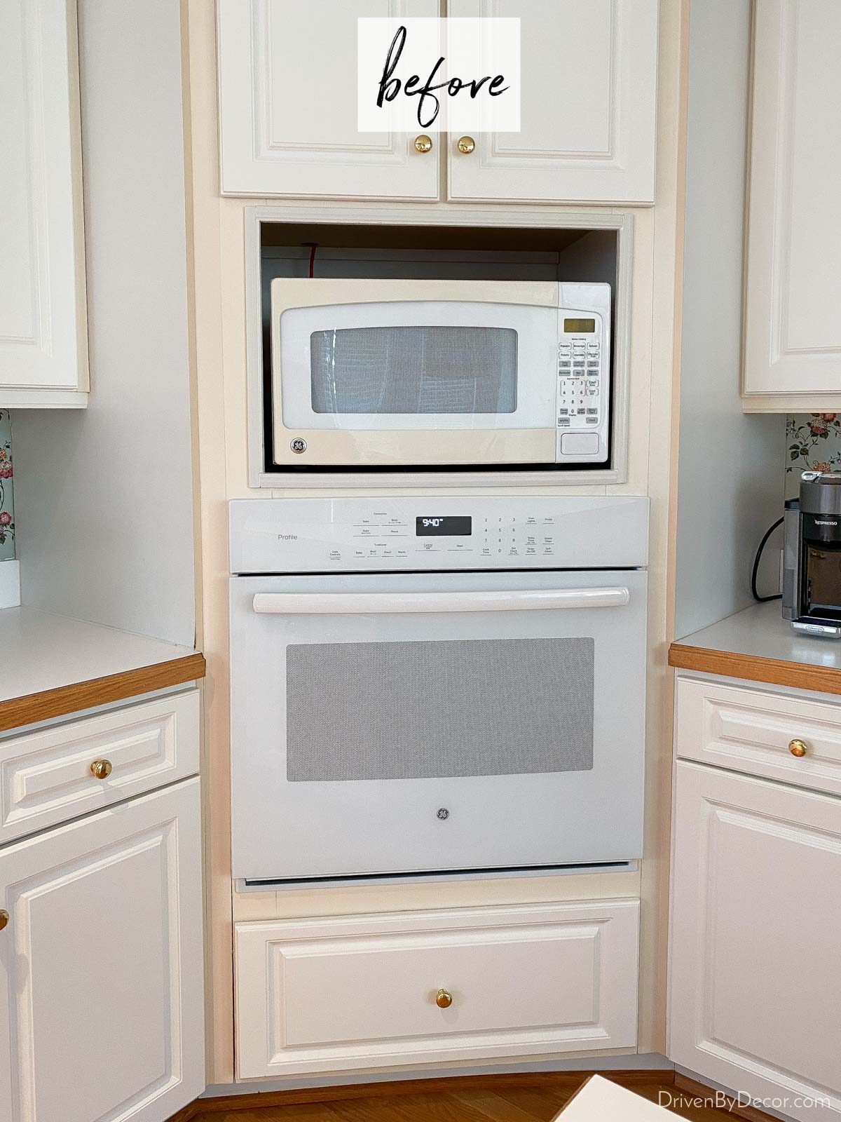 Our yellowed cabinet frames before painting as part of our kitchen remodel on a budget