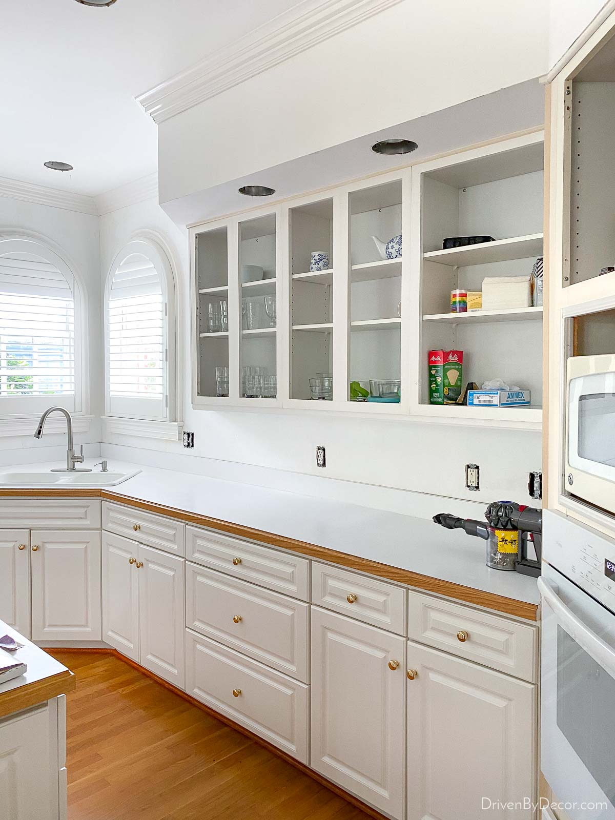 Painting your kitchen cabinets is a great budget friendly kitchen remodel option!