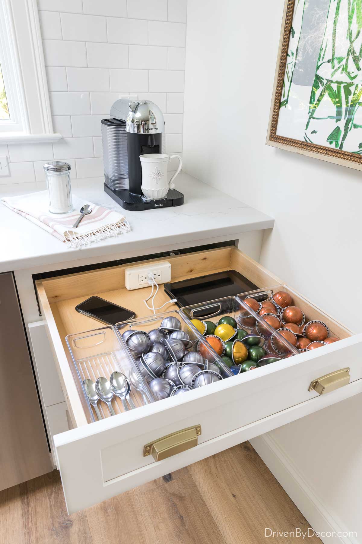 Kitchen drawer with coffee pods & built-in charger for charging electronics - love this kitchen remodel idea!