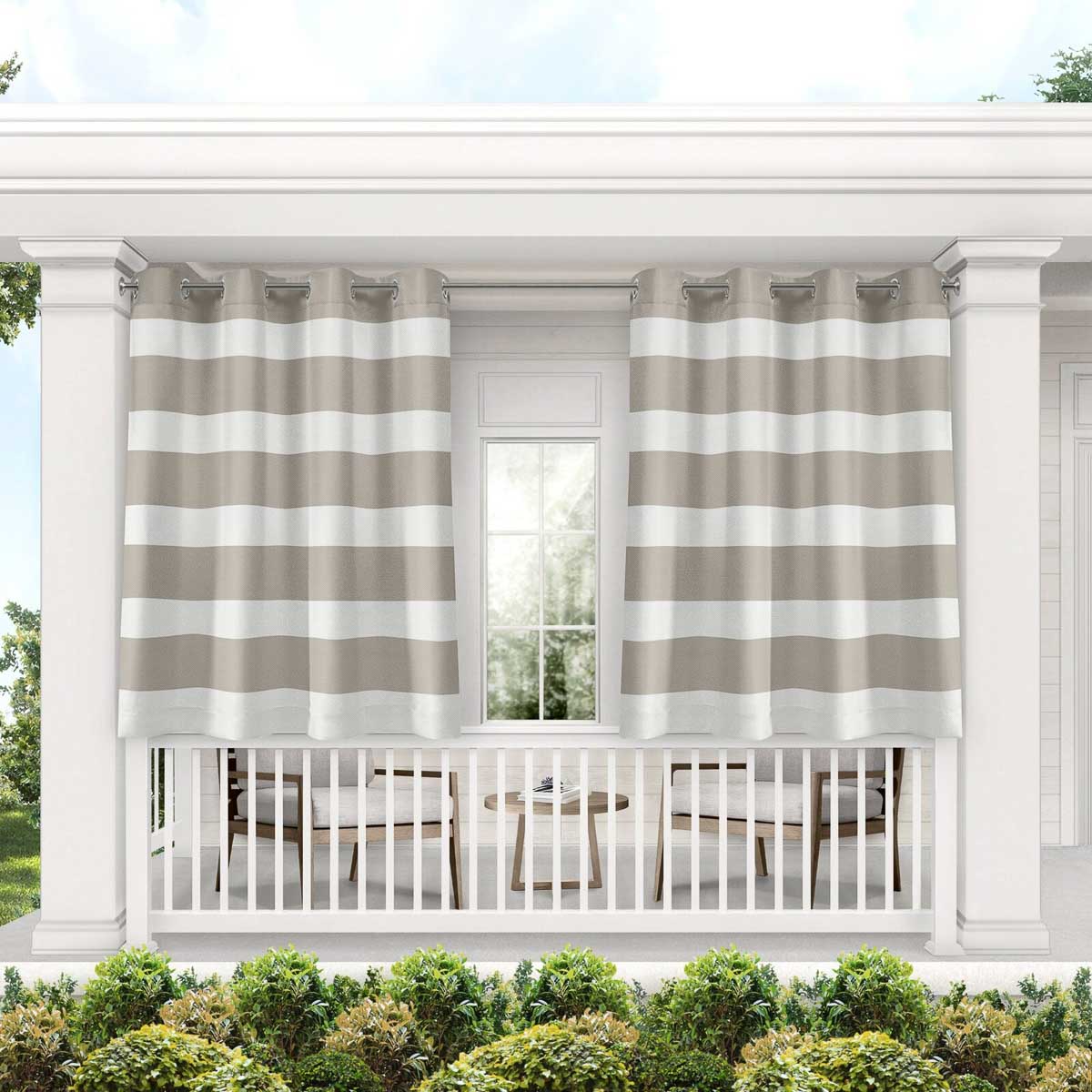 Striped outdoor curtains to shield patio from the sun