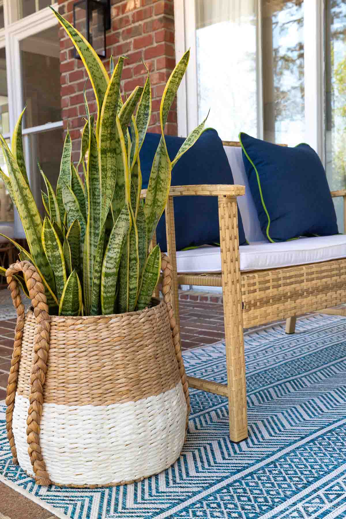 Basket used as covered porch planter
