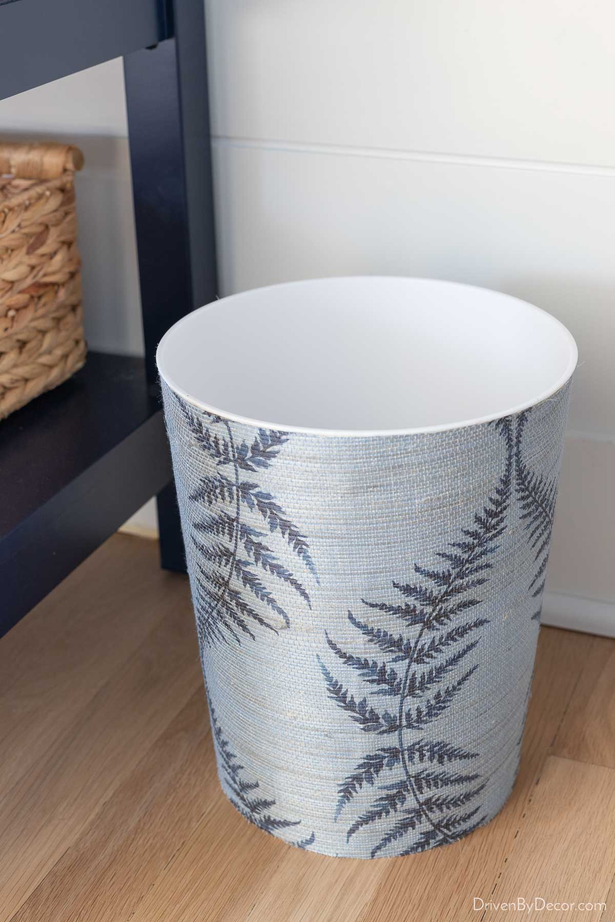 Grasscloth covered waste basket