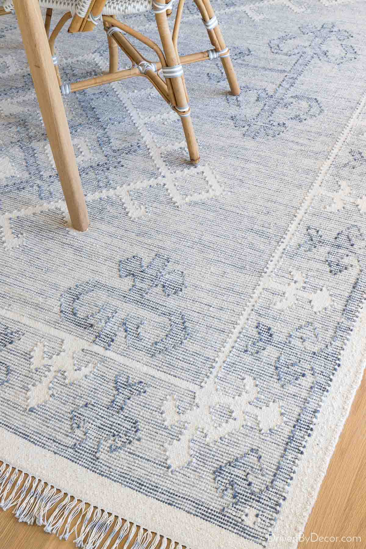 Blue and white patterned dining room rug
