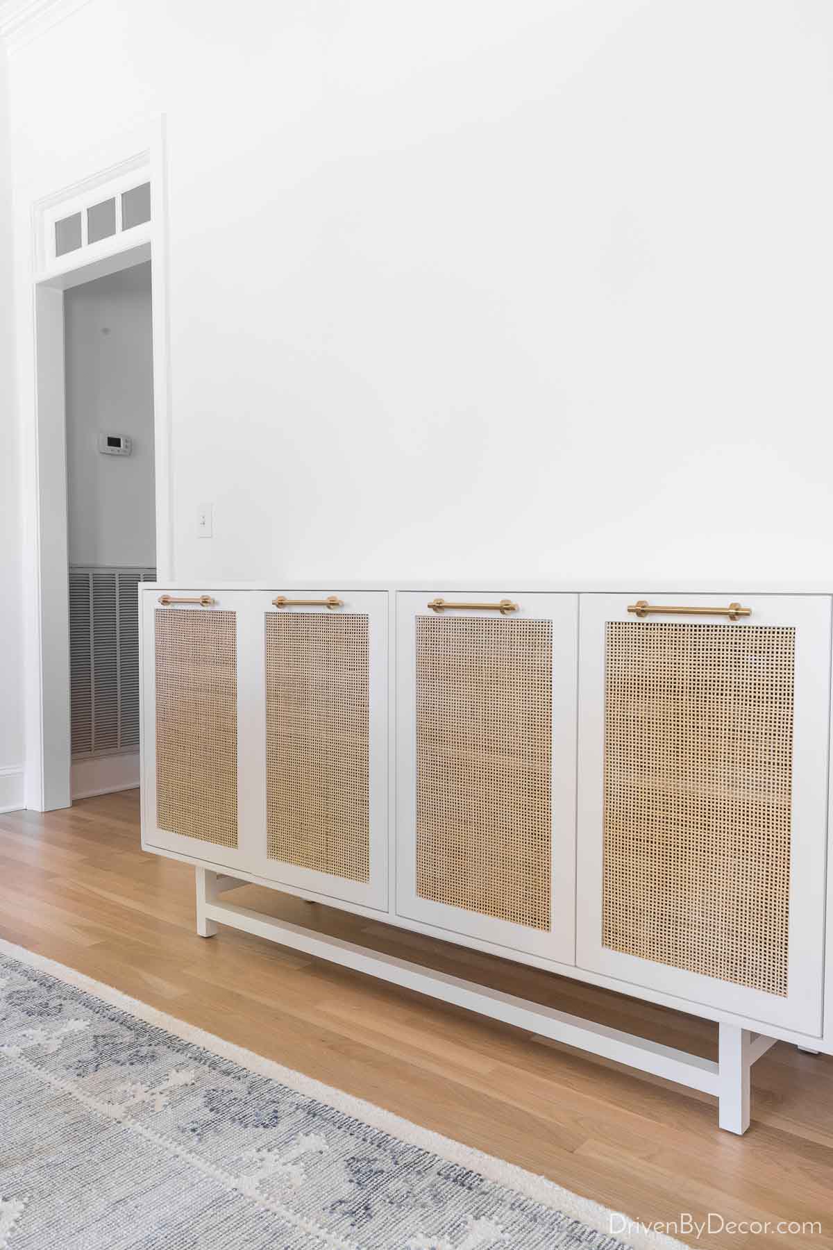 Our dining room cane and white sideboard