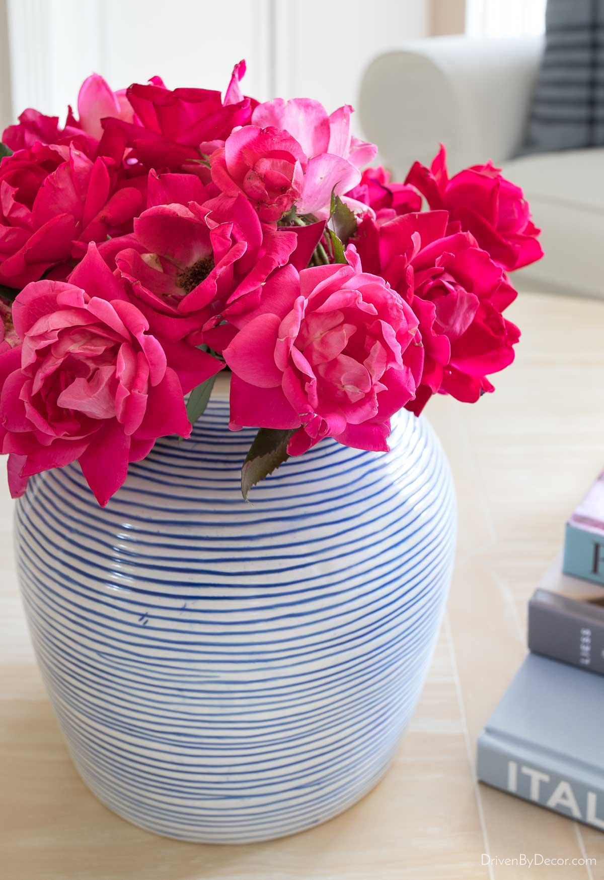 Bouquet of roses in blue striped vase