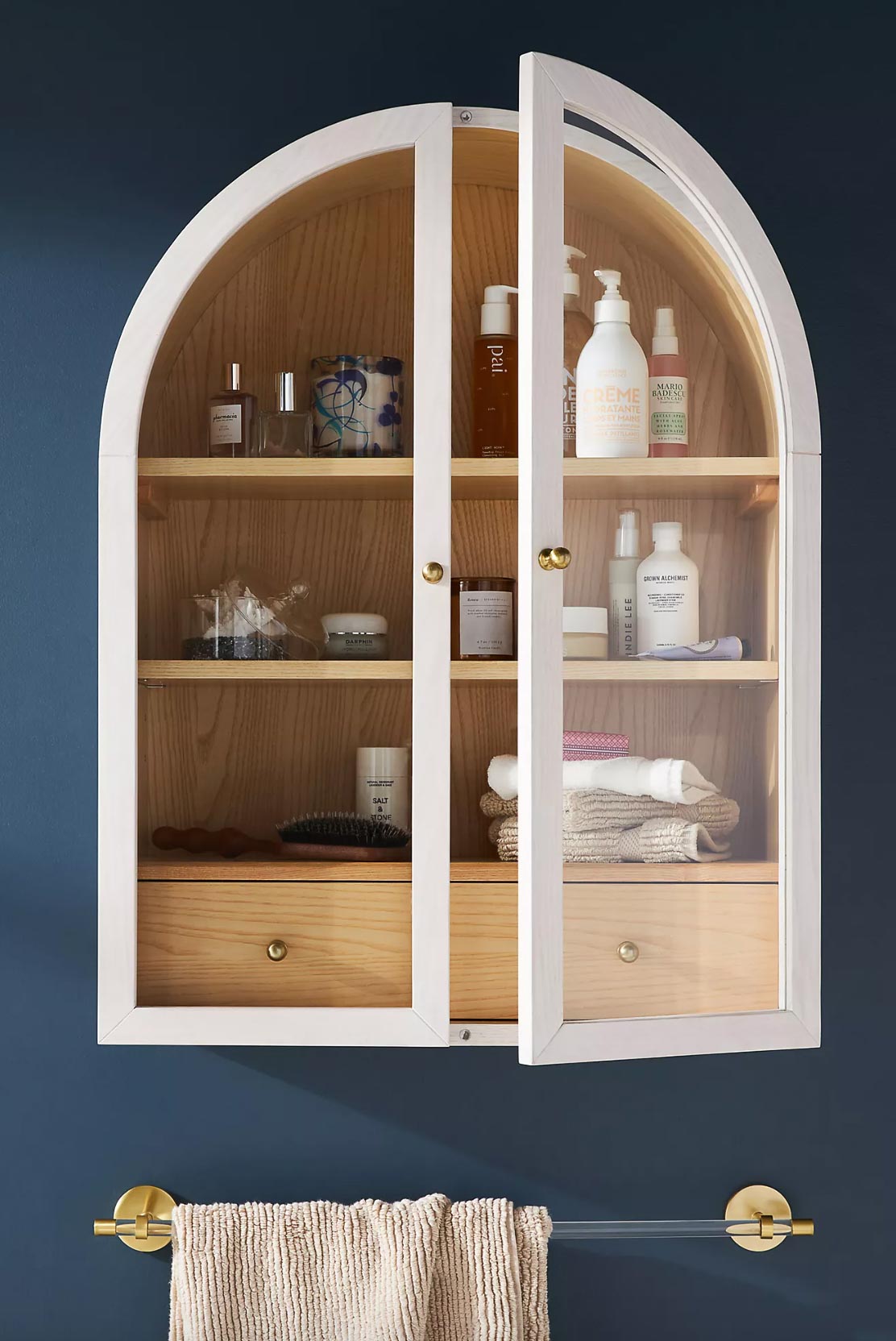 https://www.drivenbydecor.com/wp-content/uploads/2022/05/over-toilet-glass-cabinet.jpg